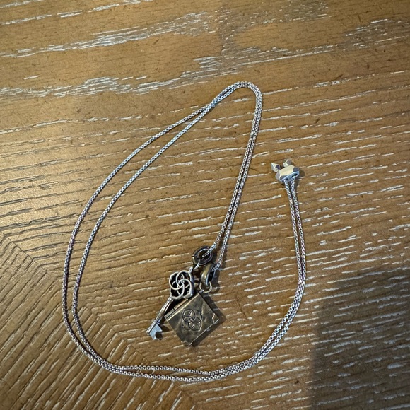 Kendra Scott Silver Charm Necklace. Adjustable Length with key and book charm. - Picture 4 of 4